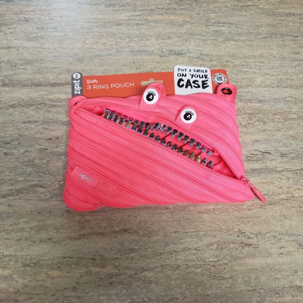 NWT Zip it monster 3-ring case. Brand new